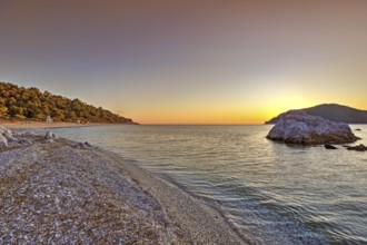 The sunset at the beach Milia of Skopelos island, Greece, Europe