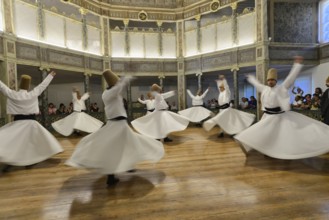 Dancing dervishes, dervish dance Sema, Mevlevihanesi Müzesi at Istiklal Caddesi, Istanbul, European