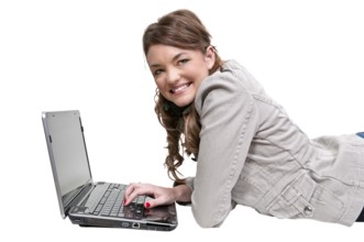 A beautiful computer savvy young woman using a laptop