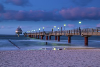 Stormy evening at the Coast of the Eastsea on an autumn day with the sea bridge at Zingst and