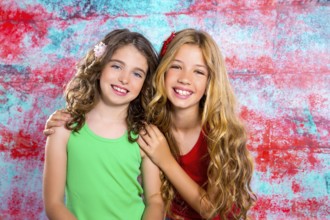 Friends beautiful children girls hug together happy smiling on grunge background