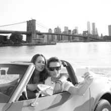 Selfie of young teen couple at convertible car in New York Brooklyn Bridge photo mount