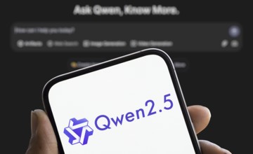 Alibaba Qwen 2.5 logo is displayed on smartphone