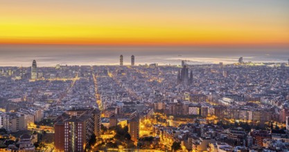 Barcelona with the Mediterranean Sea in front of sunrise