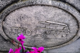 Funerary emblem of a tractor and combine, Ses Salines Cemetery, Majorca, Balearic Islands, Spain,