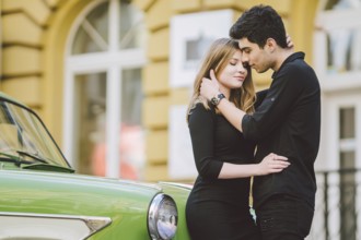 Young multiracial couple, male and female lovers heterosexual people students. Beautiful models