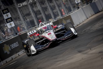 INDYCAR driver, JOSEF NEWGARDEN (2) of Nashville, Tennessee, travels through the turns in his Team