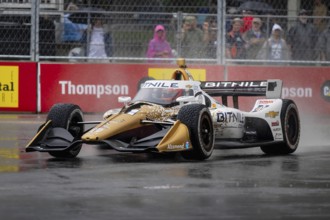 INDYCAR Series driver, RINUS VEEKAY (21) of Hoofddorp, Netherlands, travels through the turns