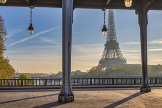 Paris France, sunrise city skyline at Eiffel Tower and Seine River Bir-Hakeim Bridge