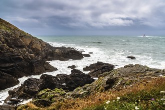 Scenic view of cliffs and sea against cloudy sky. Pointe Saint Mathieu, Brittany, France, Europe