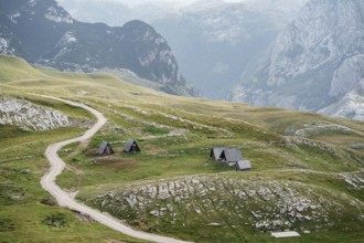 Triangular houses at the foot of the mountains in the north of Montenegro., Šavnik, Montenegro,
