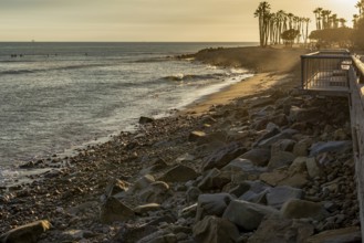 Beautiful sunset over the rocky coastline at Ventura Beach