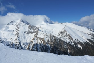 Tops of Pirin mountains view from top of cable car, ski resort Bansko, Bulgaria.