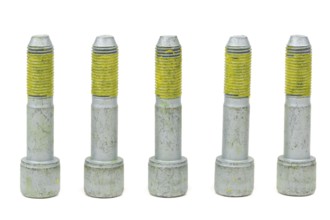 Five bolts for the car with the yellow glue on the threads. Isolate on white