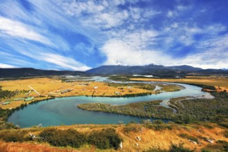 Glen Serrano. Meandering river bed of yellow autumn coast