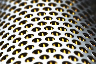 Detail of a tractor oil filter creates an industrial textured background