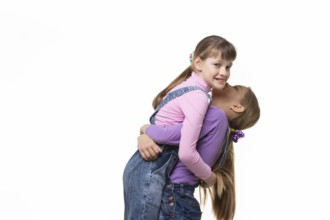 Girl lifted and hugged another a girl