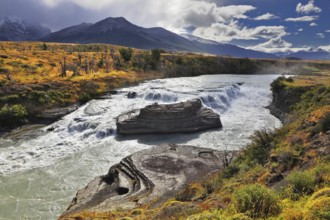 The majestic cascading waterfall - Cascades Paine. National Park Torres del Paine in southern