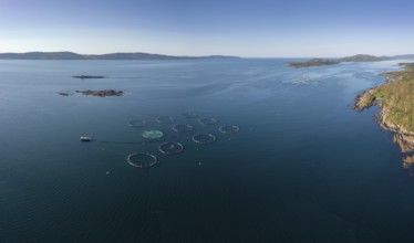 An aerial view of a salmon fish farm in Bantry Bay in County Cork of western Ireland