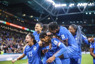 BRISBANE, AUSTRALIA, JULY 29: Wendie Renard of France scores the winning goal and celebrates with