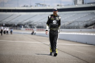 Grant Enfinger walks pit road before qualifying for the Clean Harbors 250 in Richmond, VA, USA,
