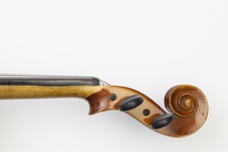 Top view close up shot of old violin on the white table. Flat Lay Image