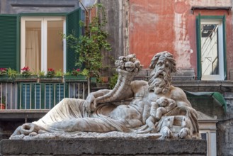 The marble statue of the Nile God in front of the church of Santa Maria Assunta dei Pignatelli,