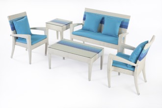 Suite of wicker furniture made of synthetic fibre on isolated background