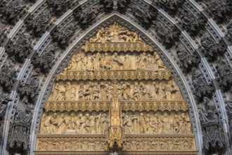 Statues of the saints above the entrance of Cologne cathedral, Germany, Europe