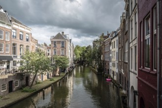 Utrecht, Netherlands, August 4, 2016: Canal in historic centre of Utrecht. Ancient city centre