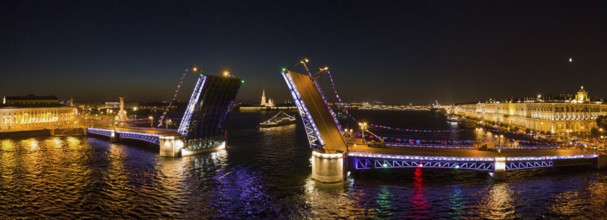 Aerial panorama of the drawn Palace bridge, Winter Palace, Peter and Paul Fortress and Rostral