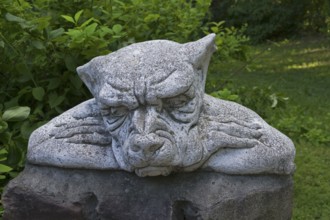 Funny sculpture in the park, fairy monster