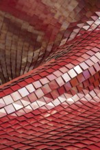 Covering of a building with the use of modern tiles of red color