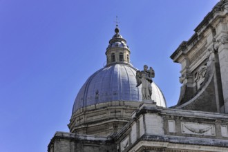 Basilica Santa Maria degli Angeli, Assisi, Umbria, Italy, Detail of an imposing dome with a statue