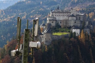 A mobile phone transmitter and Werfenweng Castle, Salzburger Land, Austria Austria