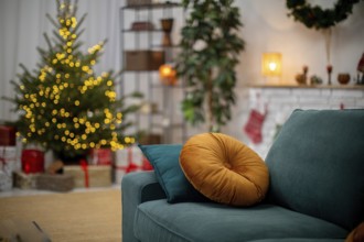 A festive living room with a decorated Christmas tree, soft couch, and delightful holiday decor