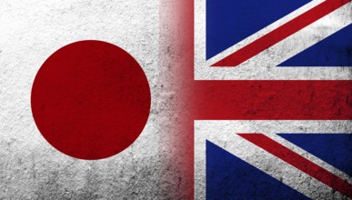National flag of United Kingdom (Great Britain) Union Jack with National flag of Japan. Grunge