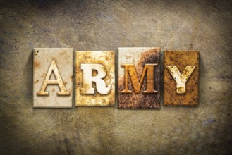 The word ARMY written in rusty metal letterpress type on an old aged leather background