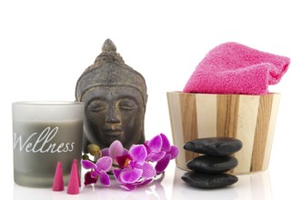 Stilllife with wellness objects as buddha towels and orchid flowers