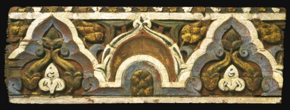 The panel's pattern achieves a fine balance between serving as a geometric border and comprising a