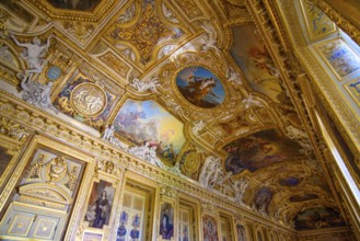 Decorated ceiling of the Apollo Gallery (Galerie d'Apollon) at Louvre Museum in Paris, France,