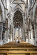An image of a man alone in the church