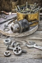 Set of old tools of the keys, screws and drills Selective focus
