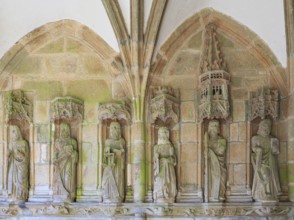 Statues of the apostles in the covered side entrance, enclosed parish Enclos paroissial, Eglise