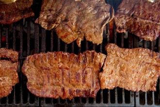 Beef meat barbecue grilled with embers and smoke american style