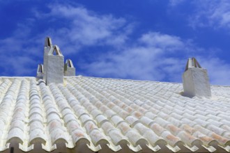 Binibequer Vell in Menorca White roof chimney Sant Lluis at Balearic Islands