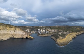 Drone view of Xlendi village and bay on Gozo Island in Malta