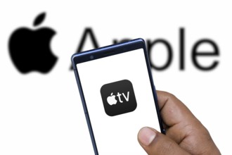 Apple TV App logo on smartphone