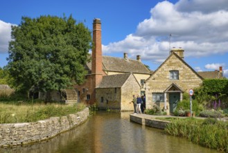 Old water mill in Lower Slaughter, a village in Cotswolds area, England, UK