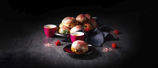 Delicious Berlin donuts filled with raspberry jam
